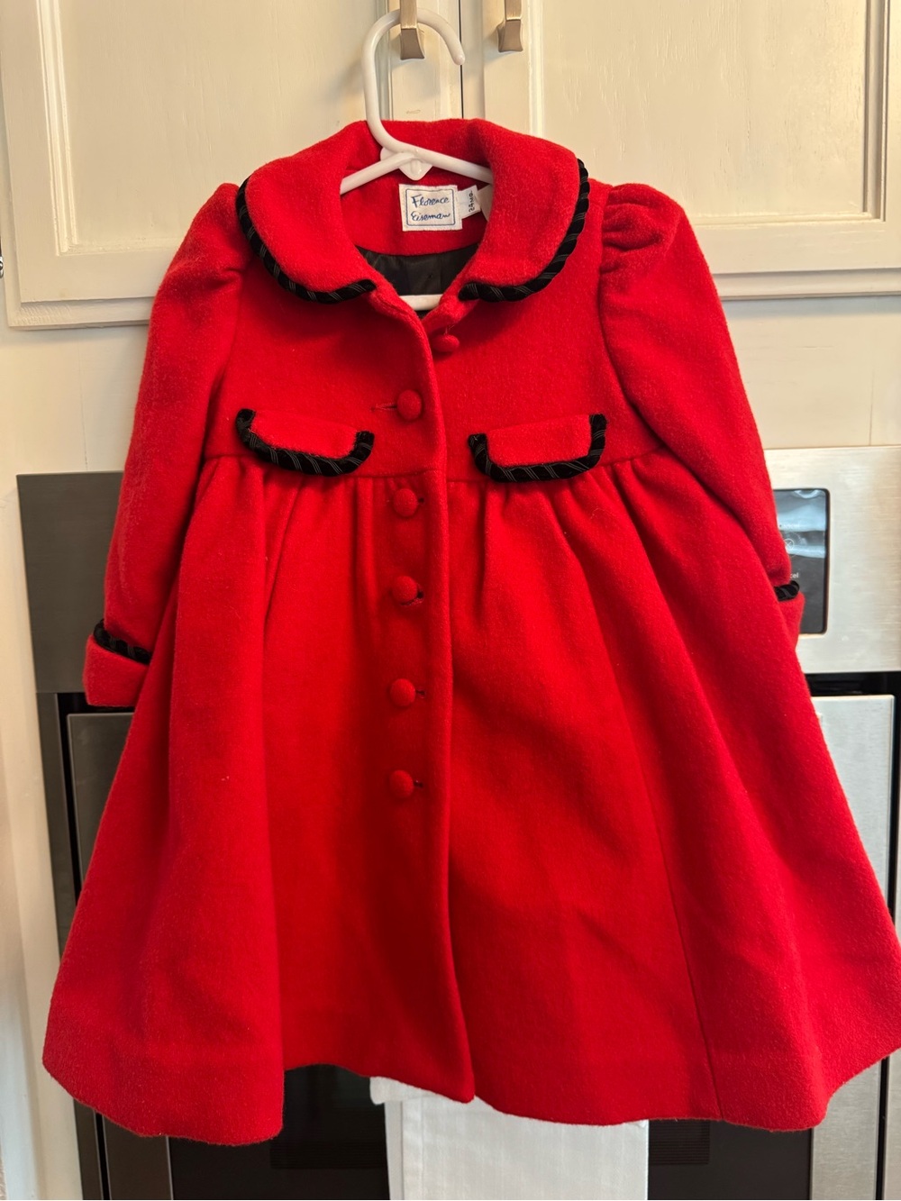 vibrant red Florence Eiseman girls' winter dress coat.